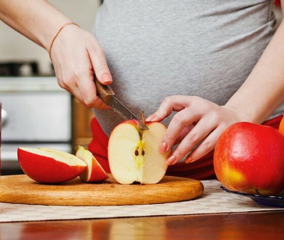 Mum cutting apples