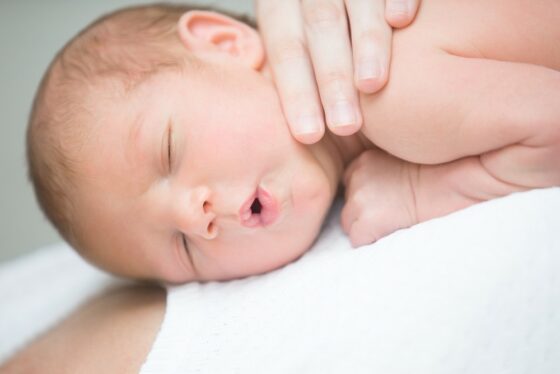 Baby sleeping while sales feeding