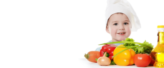 Toddler with a tray of healthy foods
