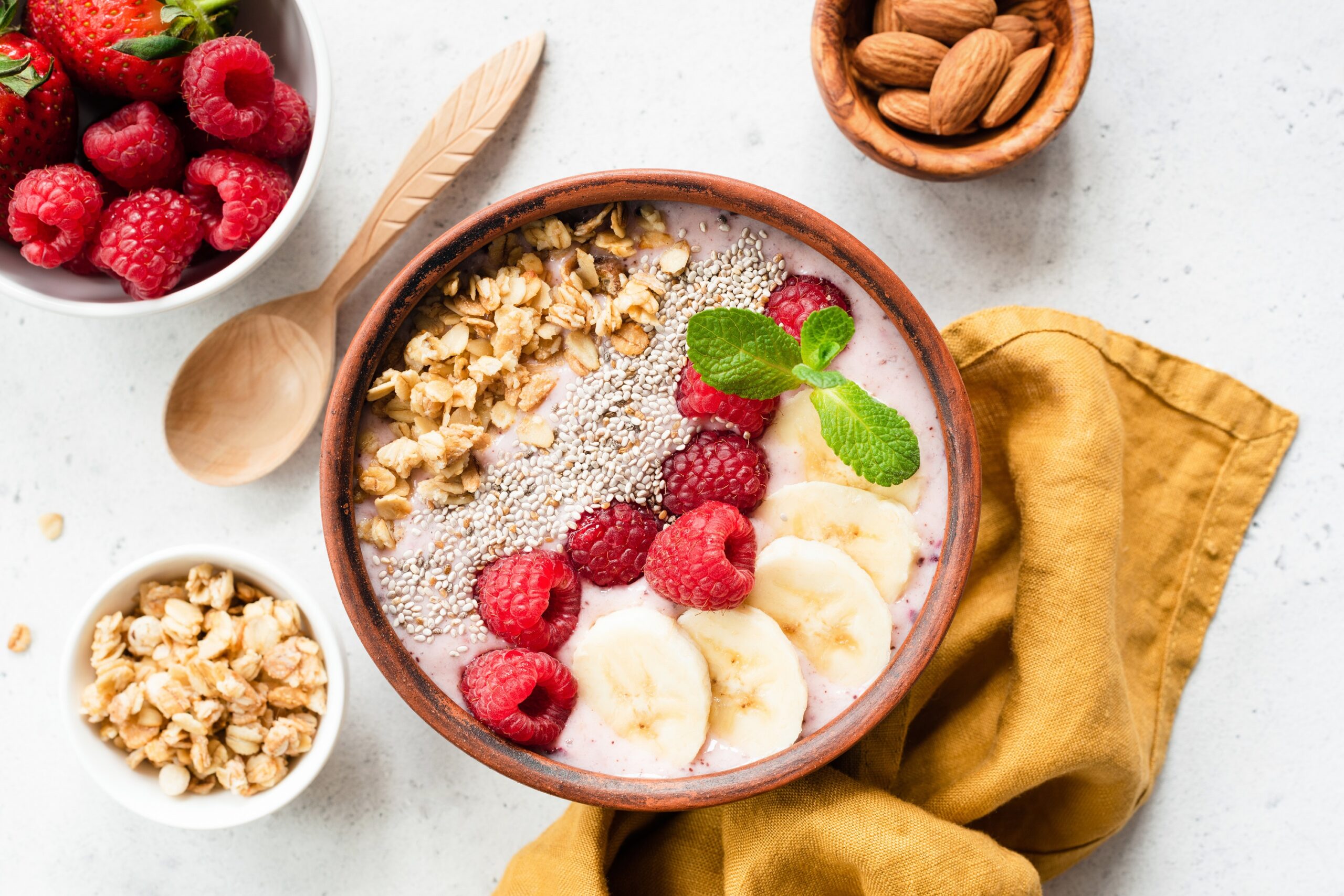 Fortisip Compact Protein Recipe: Strawberry and Acai smoothie smoothie bowl with superfood top view