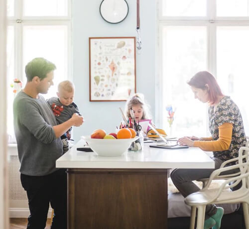 Family sitting in the living room