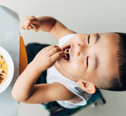 Toddler eating food