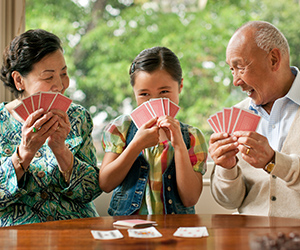 A family playing cards